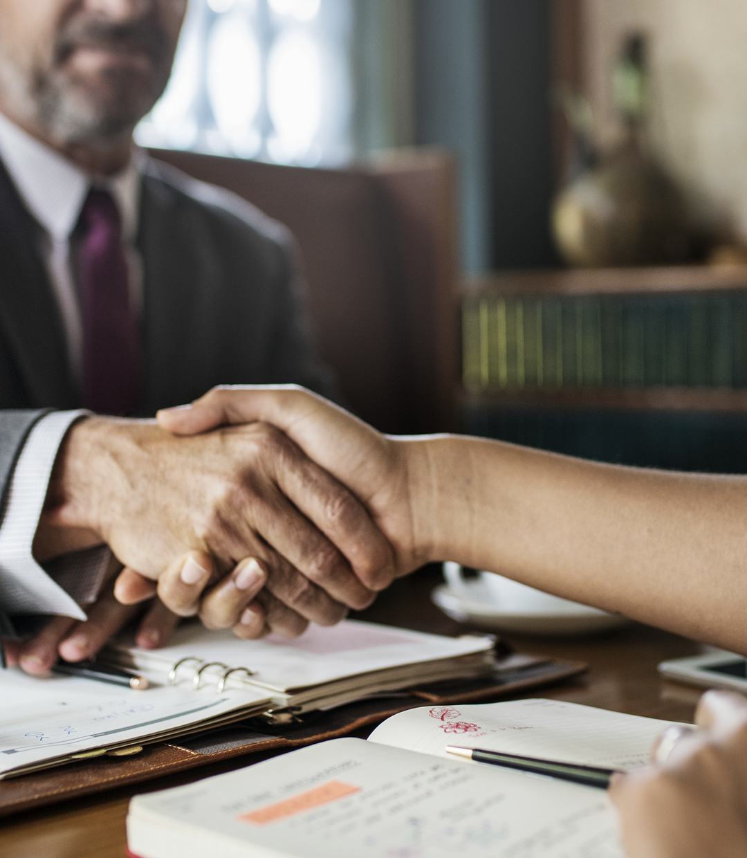 An attorney meeting with a client